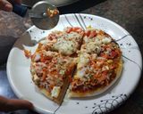 A picture of step 4 of Mix veg pizza.