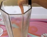 A picture of step 2 of Zesty Strawberry Milk Shake/smoothie.