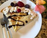 A picture of step 4 of Mixed Fruit Crepe Cake.