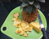 A picture of step 1 of Pineapple Sherbet Coconut Cocktail.