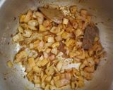 A picture of step 4 of Onion turmeric pulao wrapped in egg.