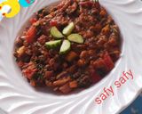 A picture of step 4 of Foul Medames with Charcoal.