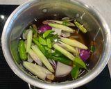 A picture of step 1 of Thin Noodles With Seafood Tom Yum.