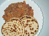 Mkate wa tandoori with coconut bean stew