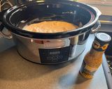 A picture of step 5 of Garlic Parmesan Slow Cooker Chicken (Buffalo Wild Wings Sauce).