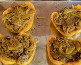 A picture of step 7 of Curried potato filled peppers with cheese.