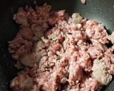 A picture of step 1 of Zucchini Tomato Italian Sausage Soup.