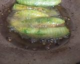 A picture of step 10 of Bharva karele.