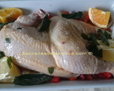 Foto del paso 4 de la receta: Pollo asado con citricos y albahaca