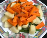 A picture of step 1 of Masala Pulao (Vegetable Pulao).