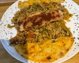 A picture of step 9 of One Pot Steamed White Fish and Savory Rice with Roasted Garlic and Tomato Sauce.