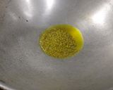 A picture of step 2 of Aachari karela.