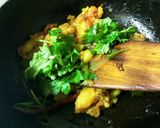 A picture of step 4 of Aloo bathe aloo choka and aloo pithika.