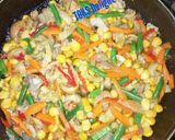 A picture of step 7 of Rice plus chicken mixed veg.