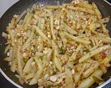 A picture of step 5 of Potato Peanuts Khichdi.
