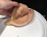 A picture of step 1 of Cheesy Stuffed Spinach Chicken.