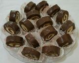 صورة لخطوة 18 من وصفة رول التمر بجوز الهند بالشكولا طعم اكتر من رائع 😋😋😋
