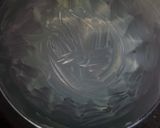 A picture of step 12 of Christmas baby choco cake.