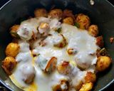 A picture of step 10 of Baby Potato Korma.