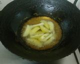 A picture of step 1 of Dahi alu.