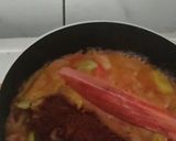 A picture of step 4 of Snakegourd and drumstick theeyal.