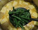 Foto langkah ke 2 dari resep Ketupat Sayur Bumbu Kuning.