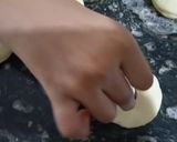 A picture of step 3 of Doughnuts.