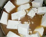 A picture of step 2 of Egg coated tofu.