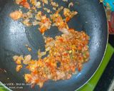 A picture of step 6 of Anda Bhurji.