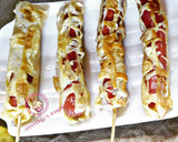 A picture of step 5 of Stick egg net sausage.