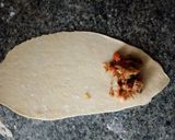 A picture of step 4 of Fried fish roll.