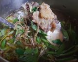 Hình bước làm 3 của món Canh xương bò nấu rau muống bắp chuối