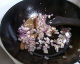 A picture of step 4 of Thor Muri Ghonto (Banana Stem cooked with Rice).