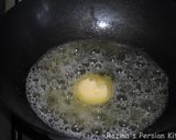 A picture of step 1 of Persian turmeric rice (Dampokhtak).
