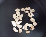 A picture of step 3 of Ari unda or rice laddoo.