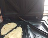 A picture of step 4 of Dahi bhalla in sandwich maker.