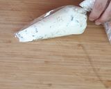 Foto del passaggio 10 della ricetta Fiori di zucca ripieni alla feta, melanzane e menta
