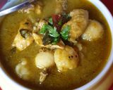 A picture of step 12 of Malabar Kozhi Pidi (rice dumplings in soupy chicken curry).