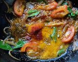 A picture of step 7 of Meen Pollichathu - Kerala special.