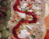 A picture of step 4 of Bread pin wheel sandwich.