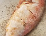 A picture of step 2 of Pan Fried Fish in Caramelized Ginger and Lemongrass.