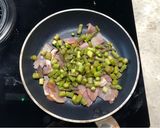A picture of step 1 of Quick asparagus, bacon & feta scramble.