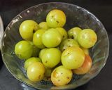 A picture of step 1 of Jaggery Amla Candy.