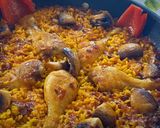 Foto del paso 7 de la receta: Arroz con muslitos de pollo, champiñones y pimientos
