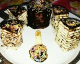 A picture of step 10 of Mariegold biscuit ka cake.