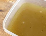 A picture of step 5 of Chicken stock with leftover chicken bones.
