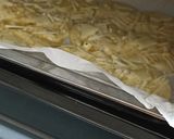 Foto langkah ke 6 dari resep Cheesy Garlic Bread.