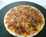 A picture of step 5 of Cheese Uttapam pizza style.