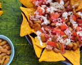 A picture of step 5 of Cheesy Mexican Nachos.