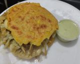 Foto del paso 16 de la receta: Arepa🫓de calabacin🥯y zanahoria rellena de pollo🍗queso🧀cebolla🧅caramelizada y salsa de ajo🧄🌿🥯